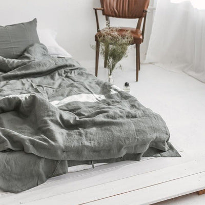 Ropa de cama cómoda de lino y algodón de cuatro piezas lavada de lino liso simple